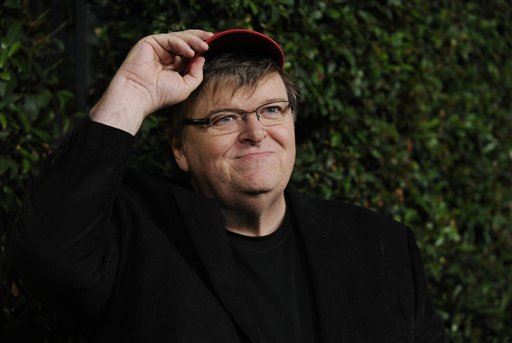 In Sniper Debate, Michael Moore Calls Snipers 'Cowards'