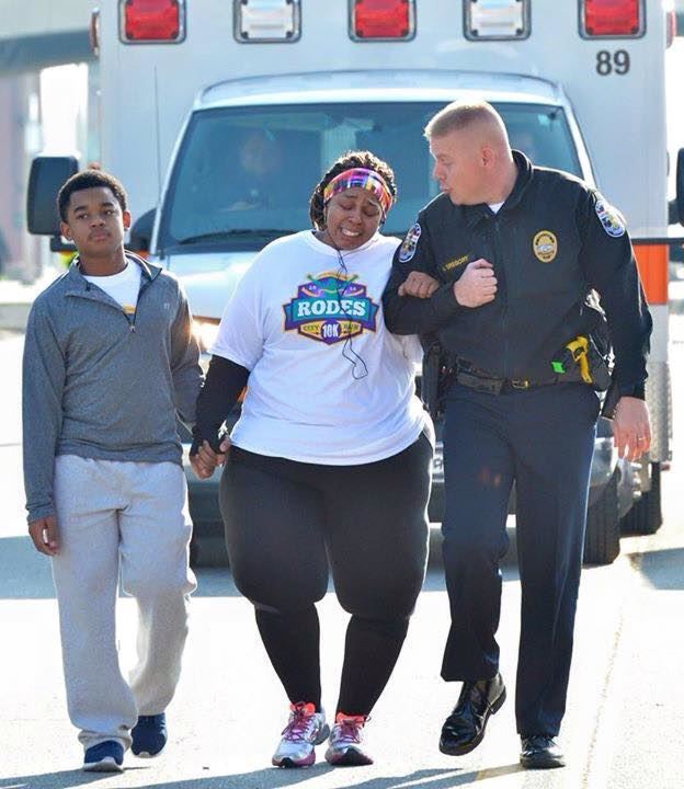 After Runner Won't Quit, Cop Helps Her Finish Race