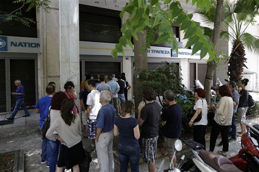 Worried Greeks Jam Nation's ATMs