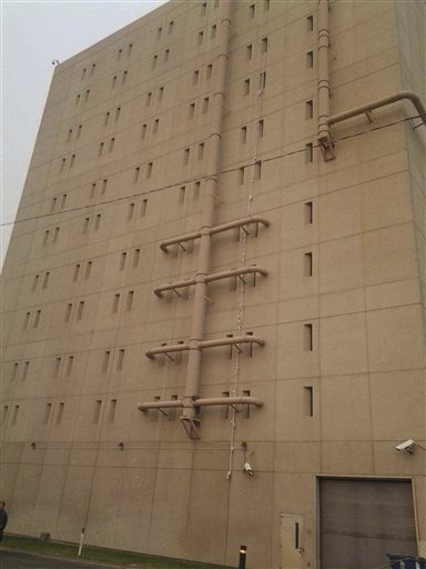 Bed Sheets Seen Hanging From Jail Cell Window