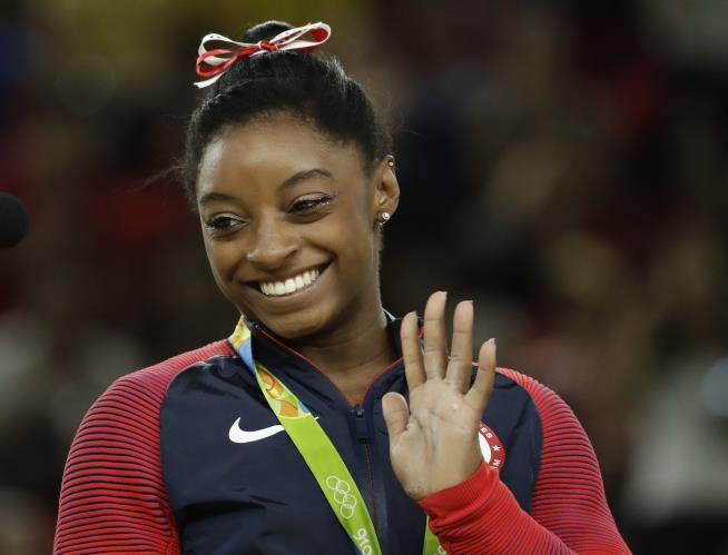Simone Biles' 3rd Gold Is a First for the US