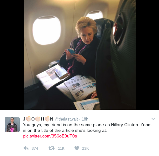 Photo of Clinton Reading Ironic Headline Goes Viral