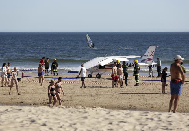 Sunbathing Man, Girl Killed When Plane Lands on Beach