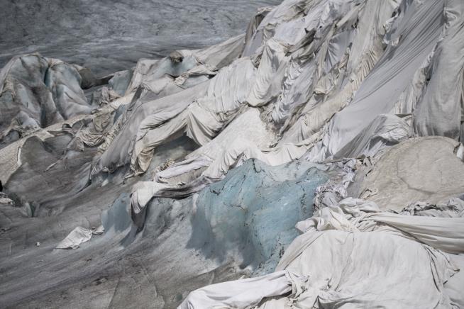 That's Not Ice Covering a Melting Swiss Glacier