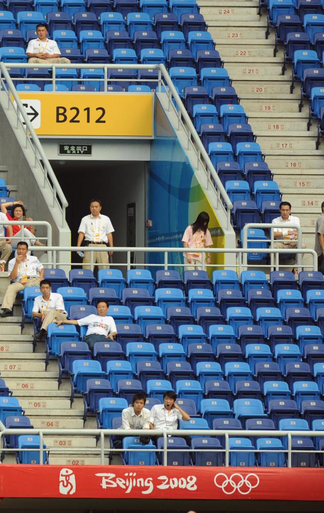 Beijing Struggles to Fill Stadiums