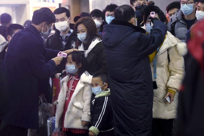 China Seals Off City at Center of Outbreak