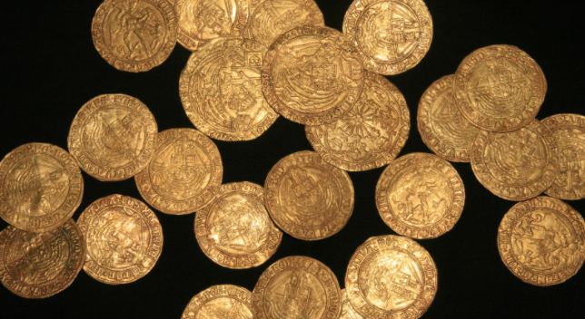 Family Weeding Garden Finds Hoard of Gold Coins