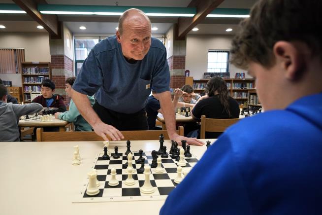 School Custodian Coaches Kids to Chess Championships