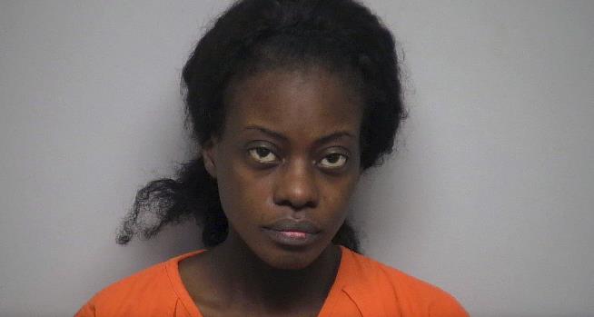 Cops: She Was Drowning 2nd Child When 3rd Intervened