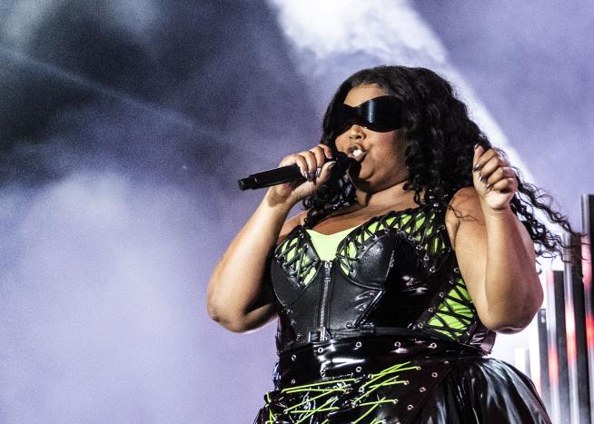 Lizzo Does an Aussie 'Shoey'