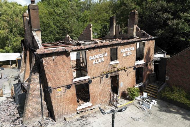Owners Must Rebuild Old Pub 'Brick by Brick'
