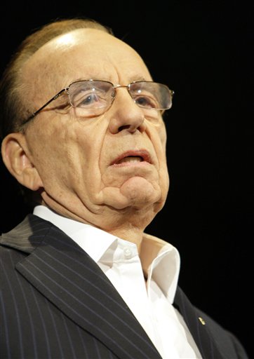 Murdoch: I'll Charge for News Sites Within Year