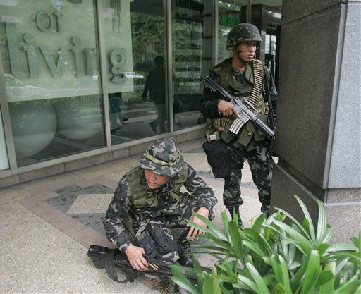Manila Rebels Surrender After Troops Storm Hotel