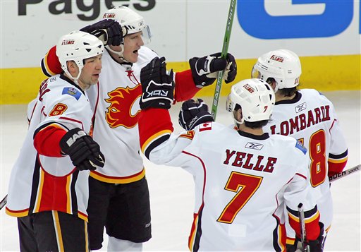 Flames Douse Host Hurricanes in Tight One