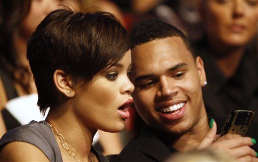 Rihanna Flips Out at Young Fan Over 'Following' Chris Brown on Twitter, Then Apologizes