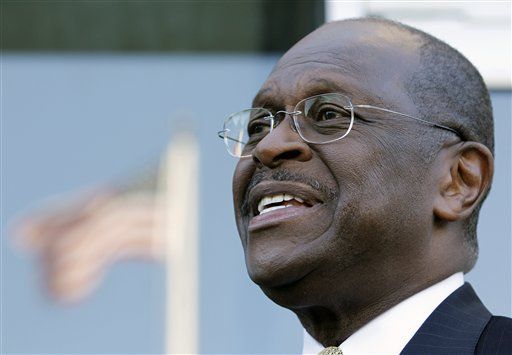 Herman Cain Takes Heat Over 9-9-9 Plan