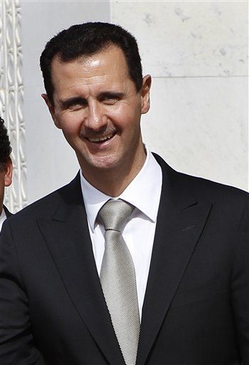 Assad: Meddle in Syria, Burn Whole Region