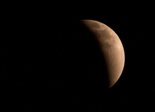 Sky-Watchers Enjoy Total Lunar Eclipse
