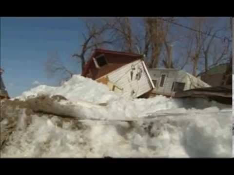 Wall of Ice Crushes Homes in Canada