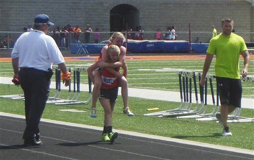 Twin Carries Her Sister to Finish Line