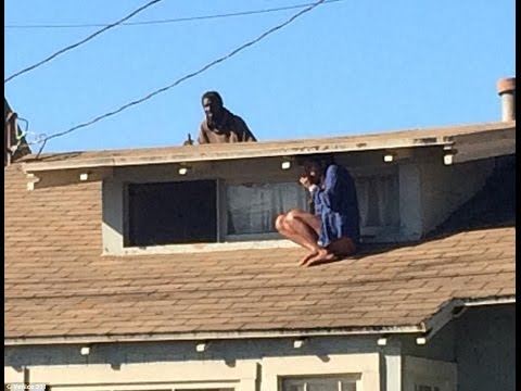 Woman's Dramatic Roof Escape Caught on Camera