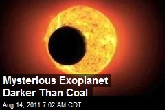 Mysterious Exoplanet Darker Than Coal
