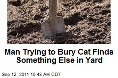 Man Trying to Bury Cat Finds Something Else in Yard