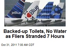 Backed-up Toilets, No Water as Fliers Stranded 7 Hours