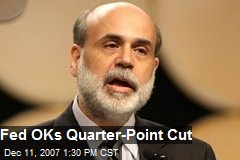 Fed OKs Quarter-Point Cut