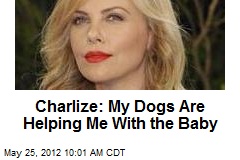 Charlize: My Dogs Are Helping Me With the Baby