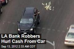 LA Bank Robbers Hurl Cash From Car