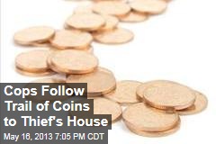 Cops Follow Trail of Coins to Thief&#39;s House