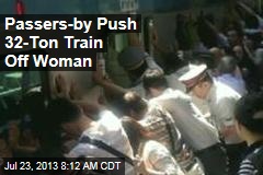 Passers-by Push 32-Ton Train Off Woman