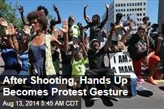 After Shooting, Hands Up Becomes Protest Gesture