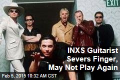 INXS Guitarist Severs Finger, May Not Play Again