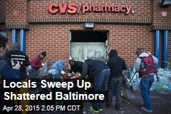 Locals Sweep Up Shattered Baltimore