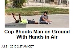 Cop Shoots Man on Ground With Hands in Air