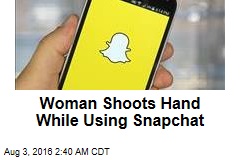 Woman Shoots Hand While Using Snapchat