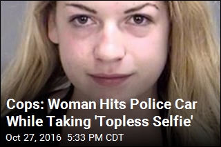 Cops: Woman Hits Police Car While Taking &#39;Topless Selfie&#39;