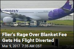 Flight Diverted After Man Fumes Over Blanket Charge