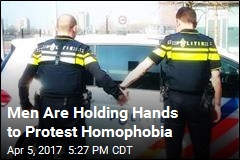 Men Are Holding Hands to Protest Homophobia