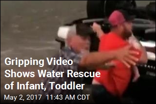Gripping Video Shows Water Rescue of Infant, Toddler