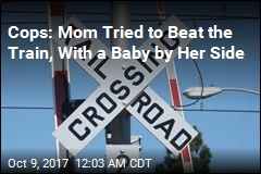 Cops: Mom Rescued Baby Seconds Before Train Hit SUV