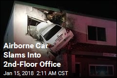 Airborne Car Slams Into 2nd-Floor Office
