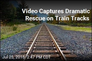 Video Captures Dramatic Rescue on Train Tracks
