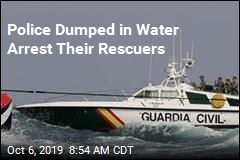 Police Dumped in Water Arrest Their Rescuers