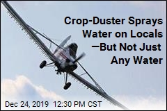 Crop-Duster Sprays Water on Locals &mdash;But Not Just Any Water