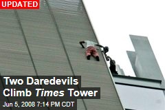 Two Daredevils Climb Times Tower