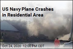 US Navy Plane Crashes in Residential Area