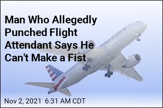 Man Who Allegedly Punched Flight Attendant Says He Can&#39;t Make a Fist